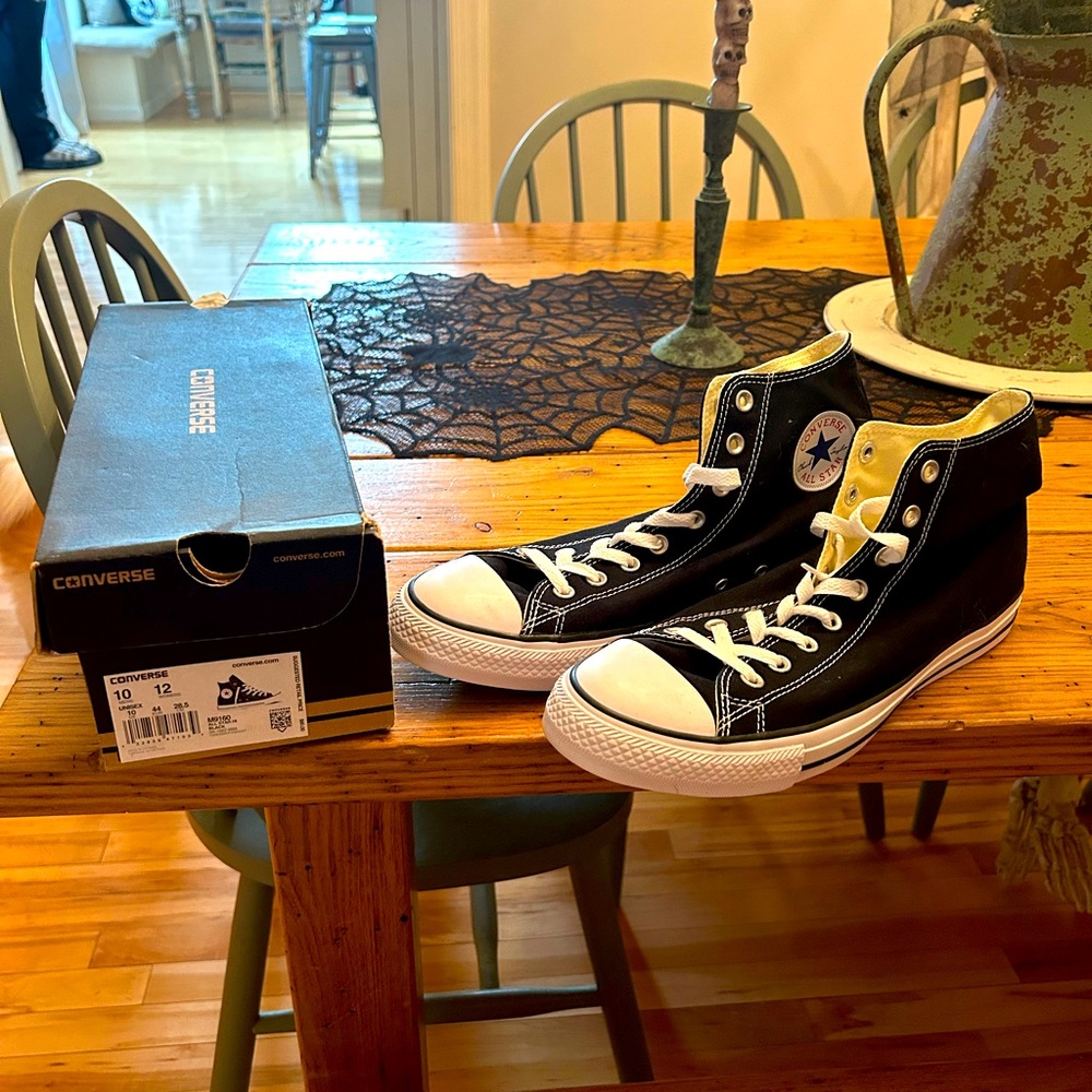 Unisex Black and White High-Top Converses. Men’s size 10, Women’s Size 12.